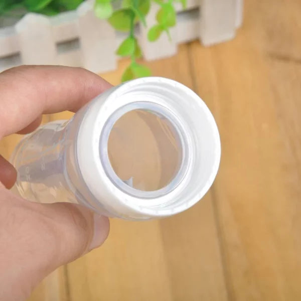 Silicone Baby Spoon Feeder Bottle
